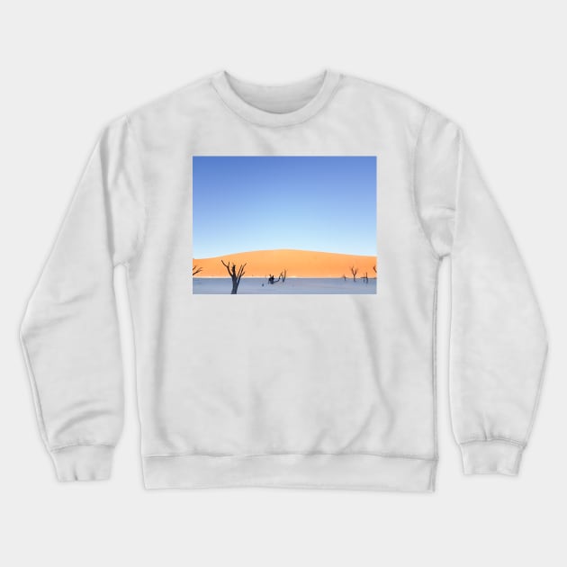 Sossusvlei dunes  landscape at Dead Vlei old trees, orange dunes dead tree and tourist in silhouette on salt pan Crewneck Sweatshirt by brians101